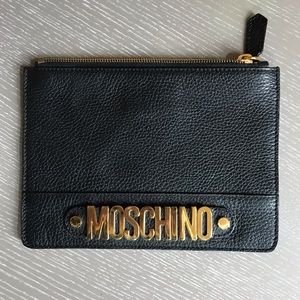 Authentic MOSCHINO leather clutch.